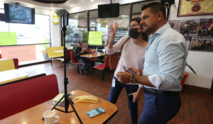 The author joins Roger Mendez, known as El Chivo, for a Facebook Live video. Mendez is an Austin influencer whose nearly 50,000 followers speak Spanish. (Austin American-Statesman photo/Briana Sanchez)