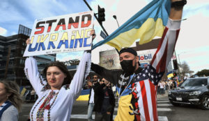 People protest the Russian invasion of Ukraine in Los Angeles. (AP Photo/Richard Vogel)