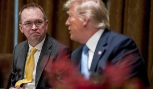 Then-president Donald Trump, right, accompanied by then-acting chief of staff Mick Mulvaney, left, speaks at a luncheon with members of the United Nations Security Council in the Cabinet Room at the White House in Washington, Thursday, Dec. 5, 2019. (AP Photo/Andrew Harnik)