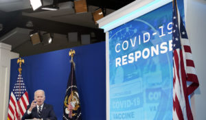 President Joe Biden speaks about the government’s COVID-19 response, in the South Court Auditorium in the Eisenhower Executive Office Building on the White House Campus in Washington, Thursday, Jan. 13, 2022. (AP Photo/Andrew Harnik)