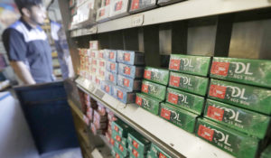 This May 17, 2018 file photo shows packs of menthol cigarettes and other tobacco products at a store in San Francisco. (AP Photo/Jeff Chiu,File)