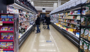 Customers shop at a grocery store in Mount Prospect, Illinois, on April 1, 2022. The USDA says food inflation rates have soared to their highest since 2008. (AP Photo/Nam Y. Huh)