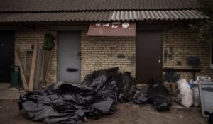 Dozens of bodies wait to be buried at a cemetery in Bucha, outskirts of Kyiv, Ukraine on Tuesday. (AP Photo/Felipe Dana)