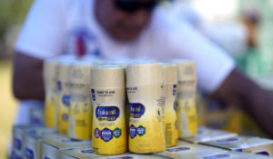 Infant formula is stacked on a table during a baby formula drive to help with the shortage Saturday, May 14, 2022, in Houston. Parents seeking baby formula are running into bare supermarket and pharmacy shelves in part because of ongoing supply disruptions and a recent safety recall. (AP Photo/David J. Phillip)