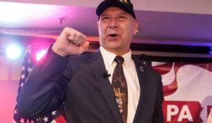 Pennsylvania State Sen. Doug Mastriano, R-Franklin, the Republican candidate for governor of Pennsylvania, gestures to the cheering crowd during his primary night election party on Tuesday night. (AP Photo/Carolyn Kaster)