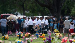 Pallbearers carry the casket of Amerie Jo Garza to her burial site in Uvalde, Texas on Tuesday. Garza was one of the students killed in last week's shooting at Robb Elementary School. (AP Photo/Jae C. Hong)
