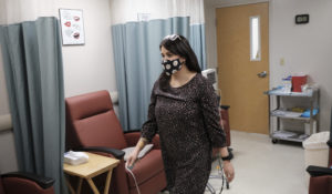 The Women’s Health Center of West Virginia executive director Katie Quiñonez walks through their recovery room in Charleston, W.Va., on Feb 25, 2022. (Chris Jackson/Associated Press)