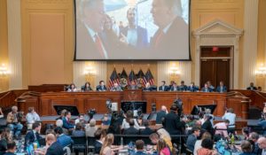 An image of former President Donald Trump talking to his chief of staff Mark Meadows is seen as Cassidy Hutchinson, former aide to Meadows, testifies Tuesday before the House select committee investigating the Jan. 6 attack on the U.S. Capitol. (Sean Thew/Pool via AP)