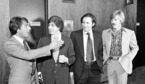Washington Post reporters Carl Bernstein, second from left, and Bob Woodward, third from left, are flanked by actors Dustin Hoffman and Robert Redford as they attend the premiere of the motion picture "All the President's Men," in Washington in 1976. (AP Photo)