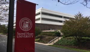 This Oct. 2, 2018, photo shows the former General Electric headquarters in Fairfield, Conn., that was purchased by Sacred Heart University in 2016. (AP Photo/Mike Melia)