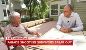 “NBC Nightly News” anchor Lester Holt, right, interviews Arnie Kamen, 89, who was shot in the leg during Monday’s mass shooting at a parade in Highland Park, Illinois. (Courtesy: NBC News)