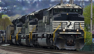 A Norfolk Southern freight train makes it way through Homestead, Pa. on April 27, 2022. (AP Photo/Gene J. Puskar, File)
