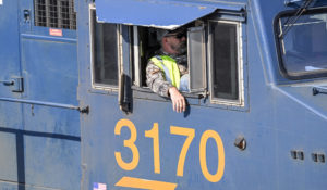 A locomotive driver, is seen as a locomotive engine arrives at the Selkirk rail yard Wednesday, Sept. 14, 2022, in Selkirk, N.Y.  (AP Photo/Hans Pennink)