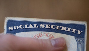 This Tuesday, Oct. 12, 2021, photo shows a Social Security card in Tigard, Ore. (AP Photo/Jenny Kane)