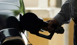 A customer pumps gas into his vehicle at this Madison, Miss., Sam's Club, on May 24, 2022. (AP Photo/Rogelio V. Solis, File)