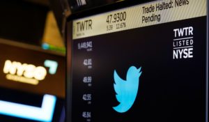 The symbol for Twitter appears above a trading post on the floor of the New York Stock Exchange on Tuesday. (AP Photo/Seth Wenig)