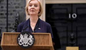 Britain’s now former Prime Minister Liz Truss addresses the media Thursday. (AP Photo/Alberto Pezzali)