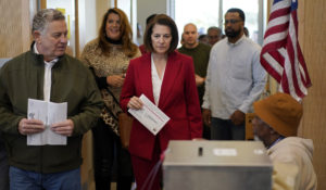 Sen. Catherine Cortez Masto, D-Nev., center, casts her vote at a polling place on Tuesday in Las Vegas. (AP Photo/John Locher)