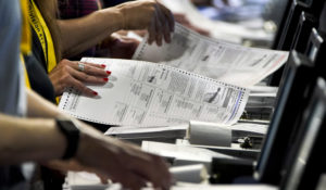 Election workers perform a ballot recount June 1 in Pittsburgh, two weeks after Pennsylvania's May 17 primary election. (AP Photo/Gene J. Puskar)