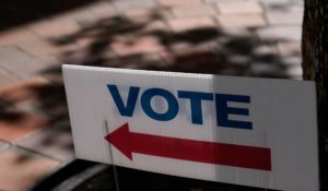 A sign is placed outside of an early voting location this week in Miami. (AP Photo/Lynne Sladky)