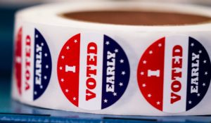 “I voted early” stickers are seen at a polling station on Oct. 25 in Milwaukee. (AP Photo/Morry Gash)
