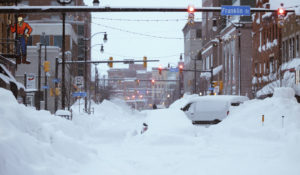 In this photo posted on the Twitter page of New York Gov. Kathy Hochul, snow from this weekends blizzard covers downtown Buffalo on Monday. (Twitter via AP)