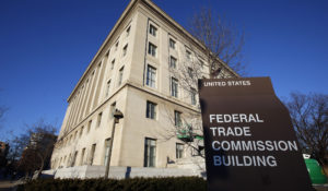 The Federal Trade Commission building in Washington is pictured on Jan. 28, 2015. The Federal Trade Commission is proposing a new rule that would prevent employers from imposing noncompete clauses on their workers. (AP Photo/Alex Brandon, File)