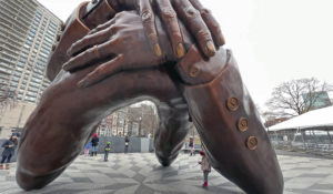 The Embrace, a new statue designed by Hank Willis Thomas and set in Boston, represents a photo of Martin Luther King Jr. and his wife Coretta Scott King embracing in a photo. (GWR/STAR MAX/IPx)