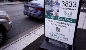 Apartment leasing sign is seen on the street in Chicago, Tuesday, Feb. 7, 2022. (AP Photo/Nam Y. Huh)