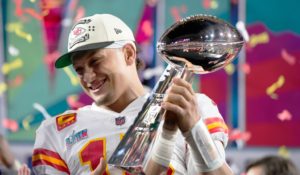 Kansas City Chiefs quarterback and Super Bowl MVP Patrick Mahomes holding the championship trophy after their win against the Philadelphia Eagles on Sunday. (AP Photo/Matt Slocum)