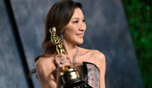 Michelle Yeoh arrives at the Vanity Fair Oscar Party on Sunday evening after winning a Best Actress Academy Award. (Evan Agostini/Invision/AP)