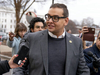 Rep. George Santos, R-N.Y., leaves a House GOP conference meeting on Capitol Hill, in Washington, Jan. 25, 2023. (AP Photo/Andrew Harnik, File)