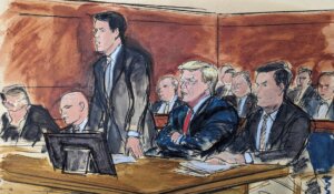 In this courtroom sketch, attorney Todd Blanche stands as he enters a plea of not guilty on behalf of former President Donald Trump, second from right, in federal court, Tuesday, June 13, 2023, in Miami. From left are: Stanley Woodward, Walt Nauta, Blanche, Trump and Chris Kise. (Elizabeth Williams via AP)