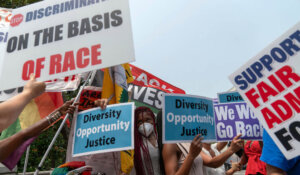 People protest outside of the Supreme Court in Washington on Thursday after the court struck down affirmative action in college admissions. (AP Photo/Jose Luis Magana)