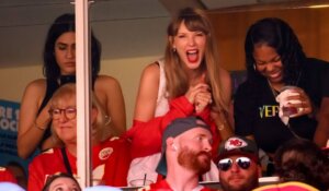 Taylor Swift, center, attended the Kansas City Chiefs NFL football game against the Chicago Bears with Travis Kelce's mother, Donna Kelce, at lower left, on Sunday in Kansas City. (AP Photo/Reed Hoffmann)