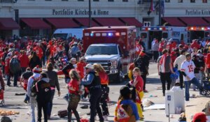 Police clear the area following a shooting at the Kansas City Chiefs Super Bowl celebration in Kansas City on Wednesday. (AP Photo/Reed Hoffmann)