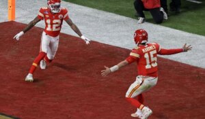 Kansas City Chiefs wide receiver Mecole Hardman Jr. (12) celebrates with Patrick Mahomes (15) after scoring the game-winning touchdown in overtime against the San Francisco 49ers, during the NFL Super Bowl 58 on Sunday in Las Vegas. The Chiefs won 25-22. (AP Photo/Adam Hunger)