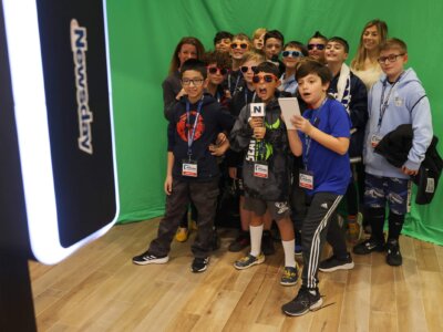 Fifth graders participate in a photo booth at the Newsday In Education visit on Nov. 29, 2023 at the Newsday headquarters in Melville, New Yorik. (Courtesy Newsday)