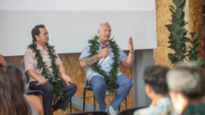 Cade Watanabe, financial secretary-treasurer, for union Unite Here Local 5, left, and Keith Vieira, principal, KV & Associates Hospitality Consulting, LLC, participate in a community conversation about the impact of private equity on Jan. 18, 2024, at the Entrepreneurs Sandbox in Honolulu, Hawaii.  (Tony Grillo/Hawaii Business Magazine)