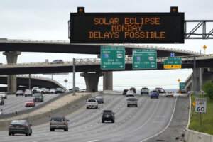 Motorists traveling toward Austin, Texas, are reminded of Monday's eclipse and the possibility of traffic delays Saturday, April 6, 2024, in Austin. (AP Photo/Charles Rex Arbogast)