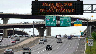 Motorists traveling toward Austin, Texas, are reminded of Monday's eclipse and the possibility of traffic delays Saturday, April 6, 2024, in Austin. (AP Photo/Charles Rex Arbogast)
