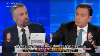 During a nationally televised debate between the two main candidates for prime minister of Portugal on Feb. 19, the Socialist Party candidate showed a printed Polígrafo fact-check to try to demonstrate that his opponent was lying. (Screenshot: SIC Notícias)