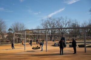 Children and adults swing along the Skyline Swing at the The Anna C. Verna Playground in Franklin Delano Roosevelt Park in Philadelphia, Pennsylvania, on Saturday, Dec. 16, 2023. Alexandra Lange's articles about such public spaces, written for Bloomberg CityLab, were awarded a Pulitzer Prize for Criticism on Monday. (Courtesy: Caroline Gutman/Bloomberg)