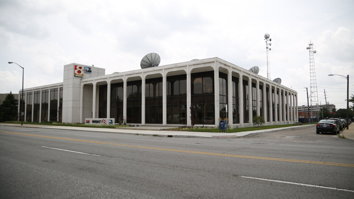 A large, white building with dark windows