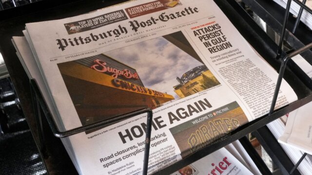 Photo of the front page of the Pittsburg Post-Gazette newspaper. The headline reads "HOME AGAIN"